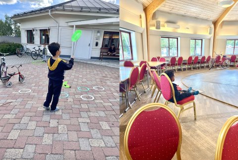 en pojke leker med cirkussaker och en liten pojke sitter och kollar på en cirkusföreställning