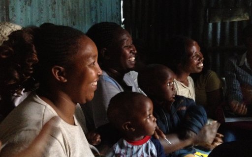 Vuxna och barn i publiken